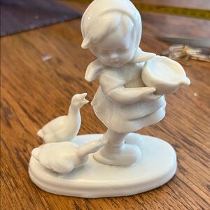 Charming White Porcelain Figurine